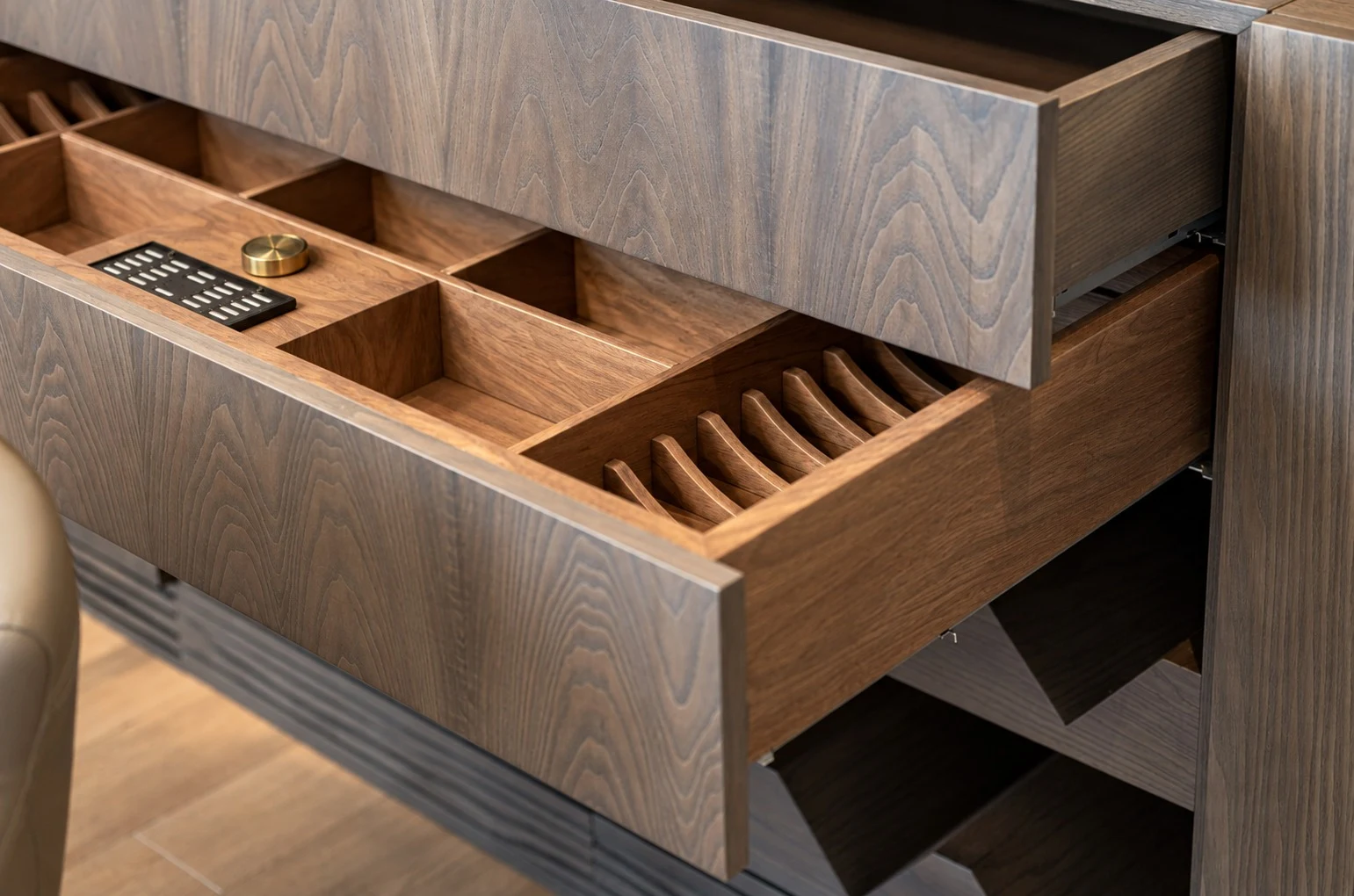 Bvlgari Residences II — The custom-made timber humidor is precisely compartmented, combining specialist storage with refined joinery.